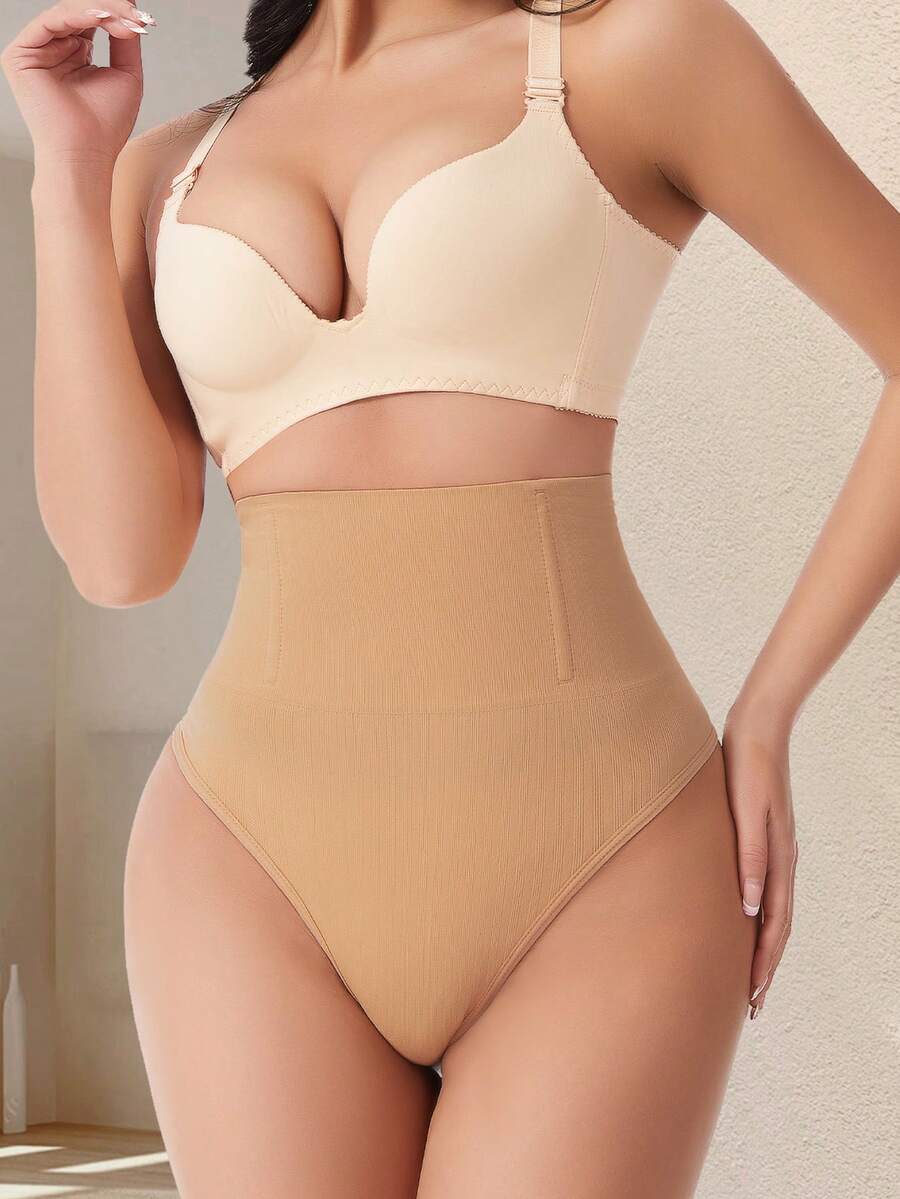 Apricot high waist seamless shaping panties for women displaying tummy control design.