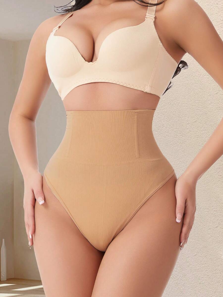 Apricot high waist seamless shaping panties for women displaying tummy control design.