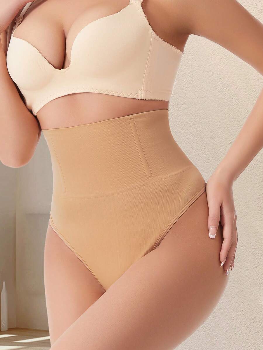 Apricot high waist seamless shaping panties for women displaying tummy control design.