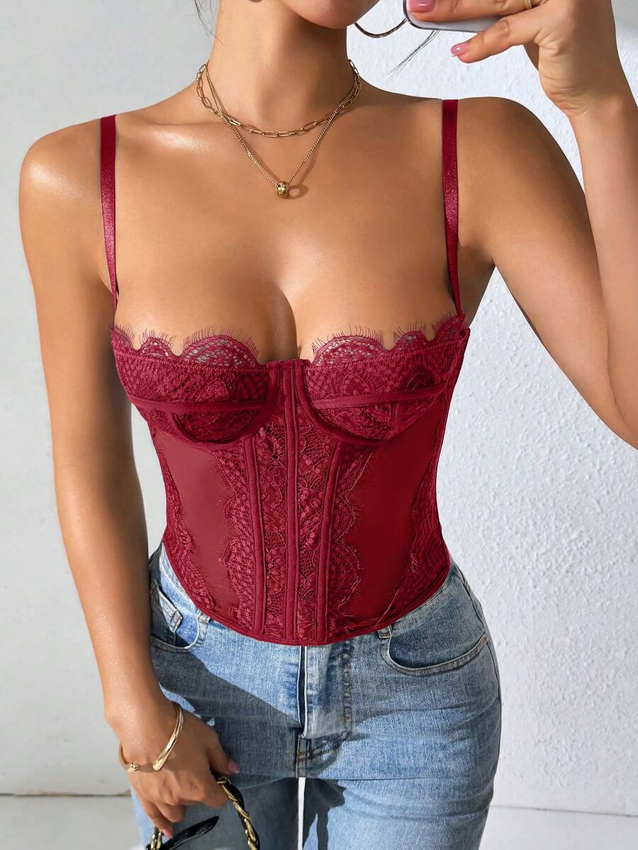 Women's brown lace trim cami corset crop top featuring a low cut neck, unlined body, and slim fit bodycon silhouette.