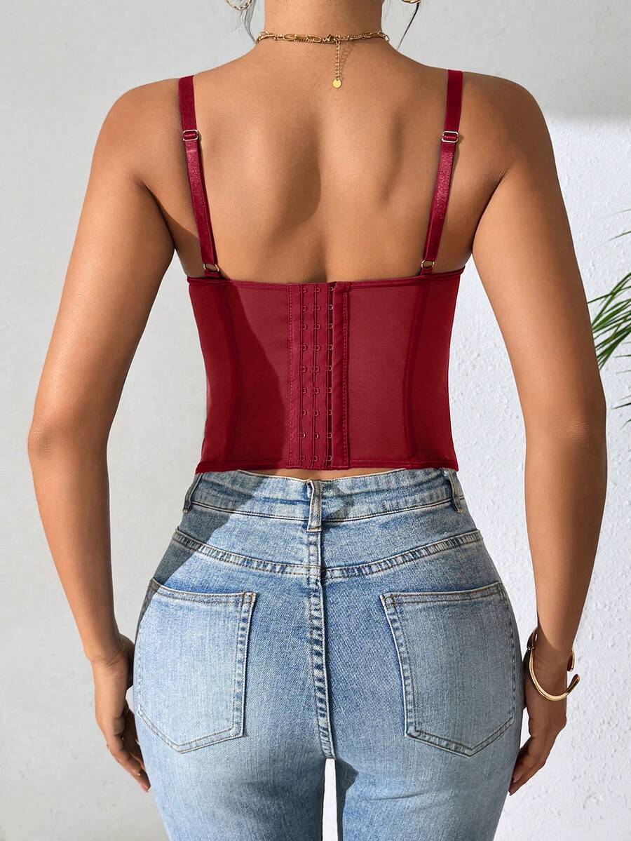 Women's brown lace trim cami corset crop top featuring a low cut neck, unlined body, and slim fit bodycon silhouette.