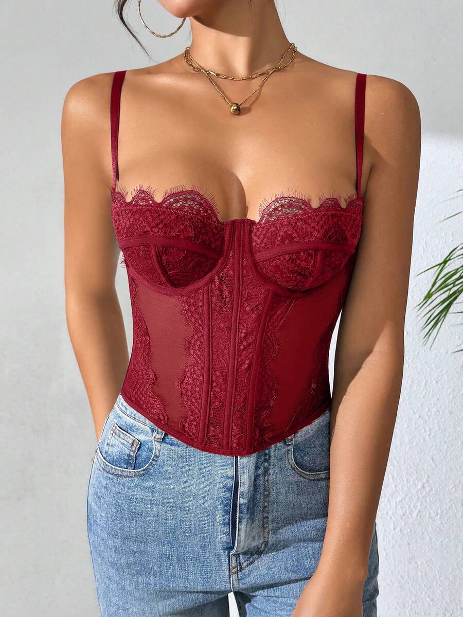 Women's brown lace trim cami corset crop top featuring a low cut neck, unlined body, and slim fit bodycon silhouette.