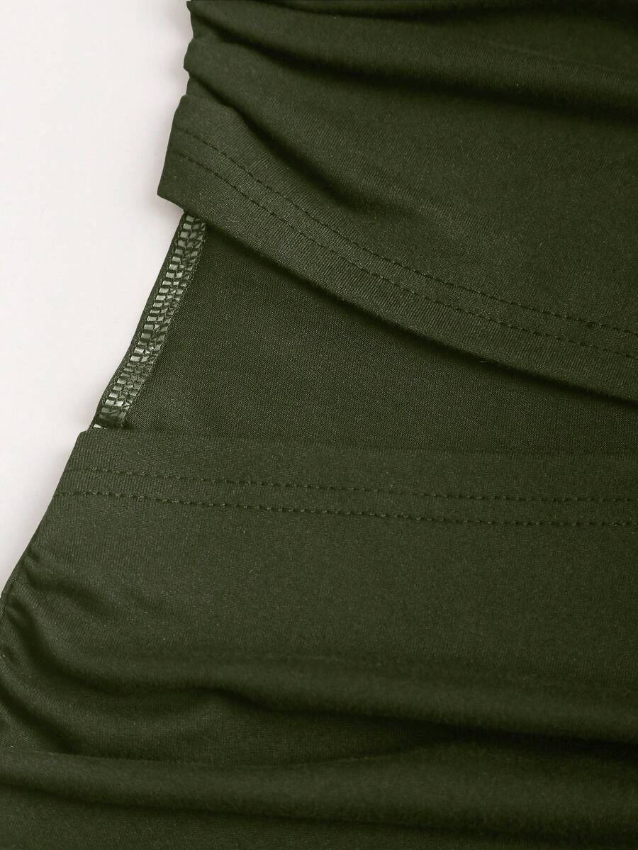 Women's black strapless bodycon mini dress featuring ruched detailing, cut-out design with ring accent, mid-waist pencil hem, and slim fit knitted stretch fabric.
