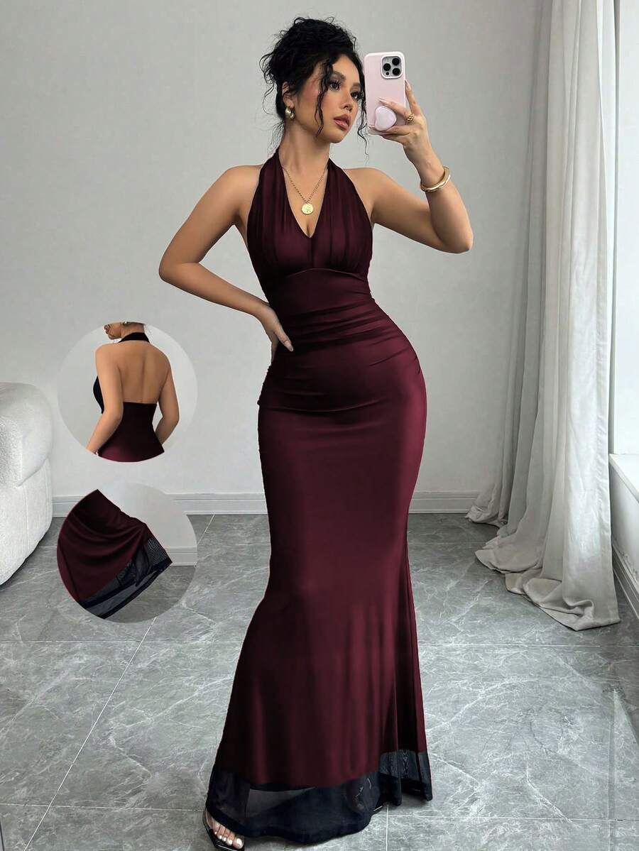 Women's long sleeve mermaid bodycon dress in high-stretch mesh fabric featuring a halter backless neckline, ruched high waist, and slim fit silhouette for formal evening wear.