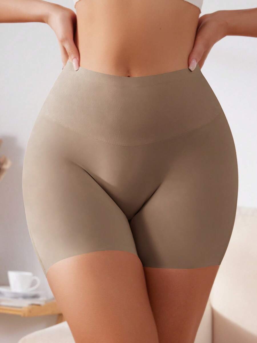 Women wearing apricot super high waist shapewear shorts designed for ultra-light thigh smoothing