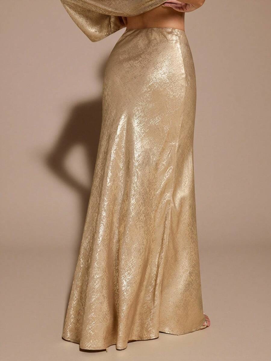 Black low waist extra long mermaid maxi skirt with asymmetrical zipper detail and side slit.