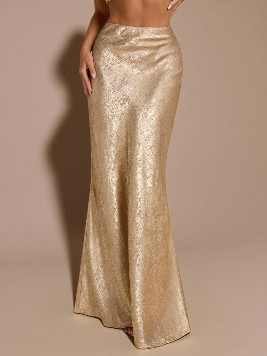 Black low waist extra long mermaid maxi skirt with asymmetrical zipper detail and side slit.
