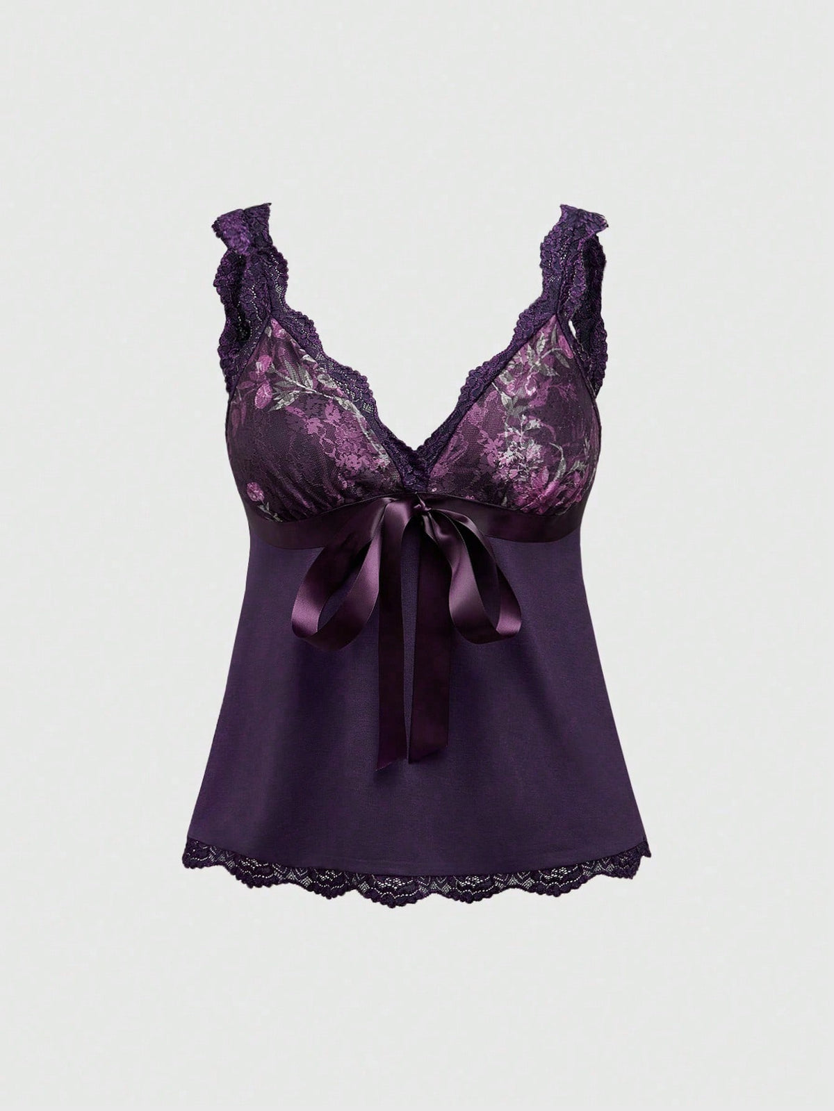 Women's black crop camisole top with rose pattern contrast lace, deep V-neck, and wide shoulder straps.