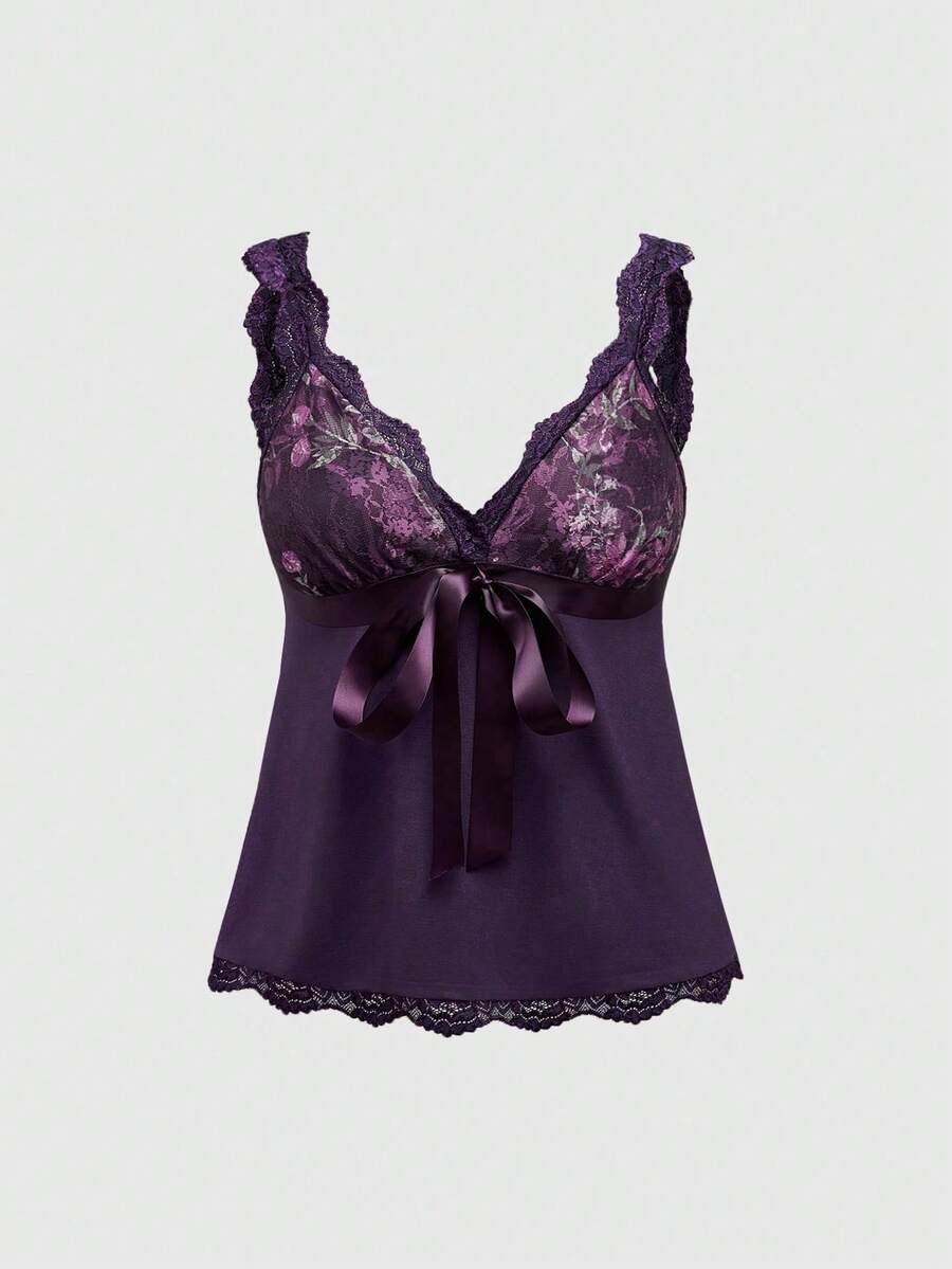 Women's black crop camisole top with rose pattern contrast lace, deep V-neck, and wide shoulder straps.