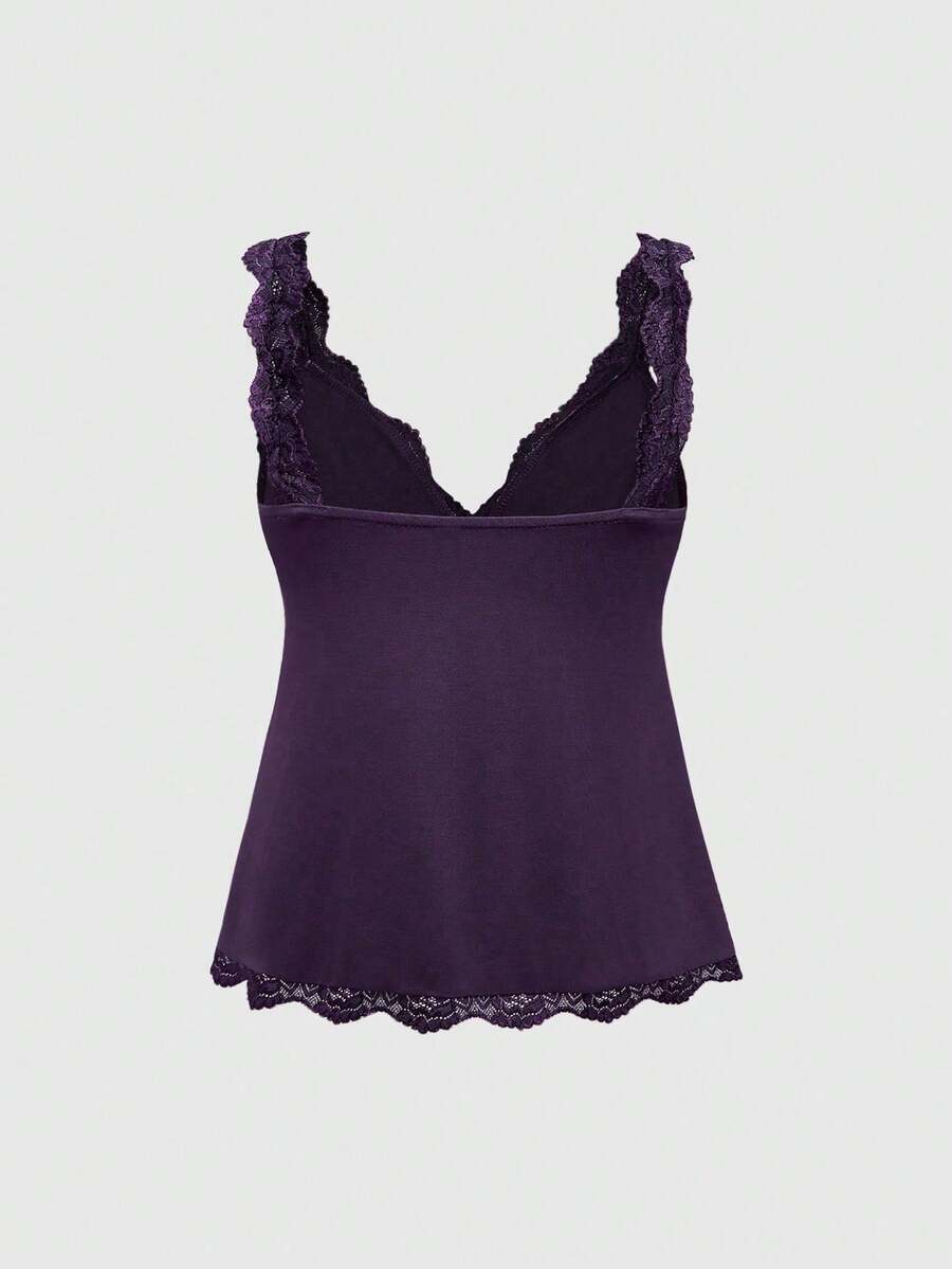 Women's black crop camisole top with rose pattern contrast lace, deep V-neck, and wide shoulder straps.