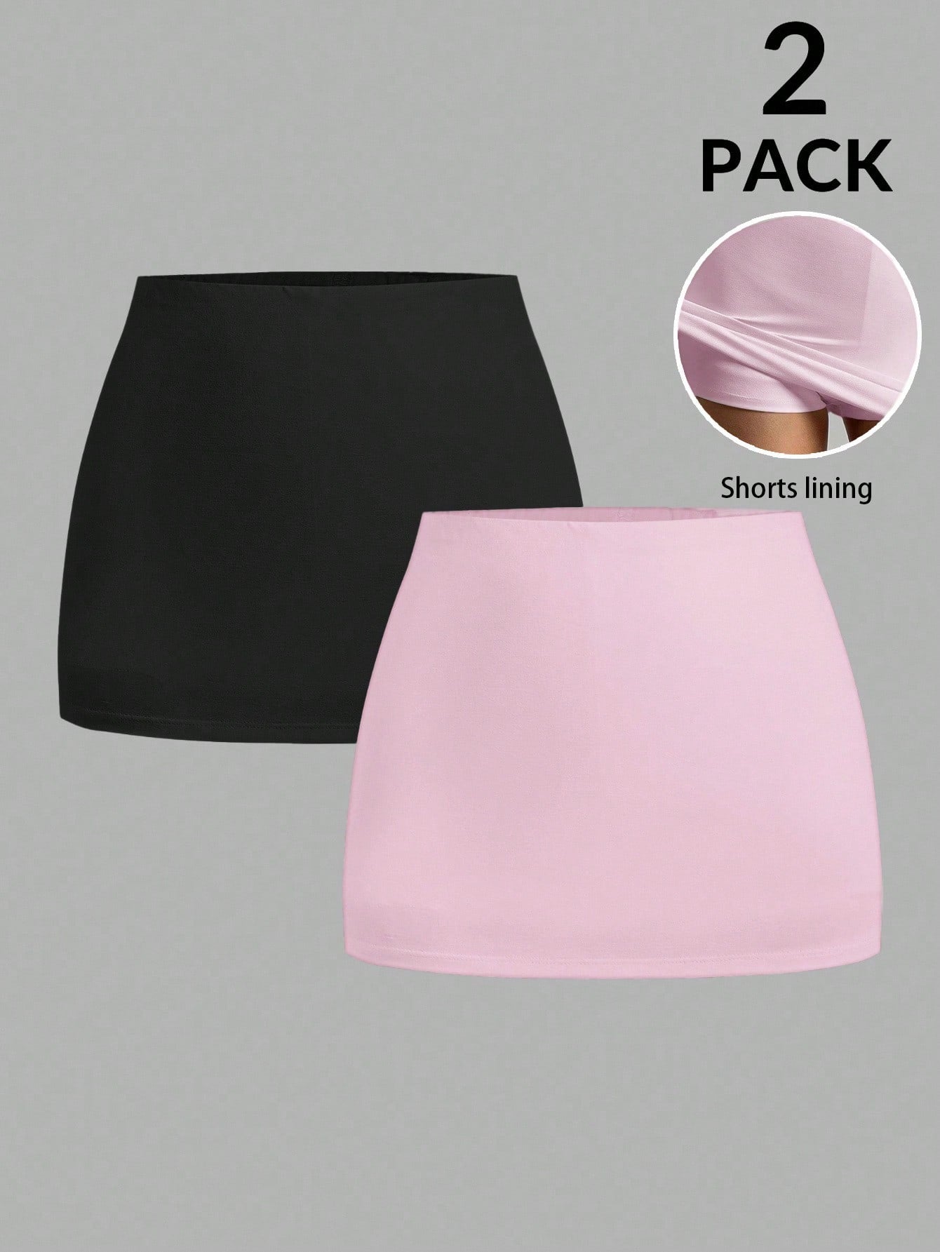 Women's black casual low rise bodycon mini skort with built-in shorts in knitted plain stretch fabric.