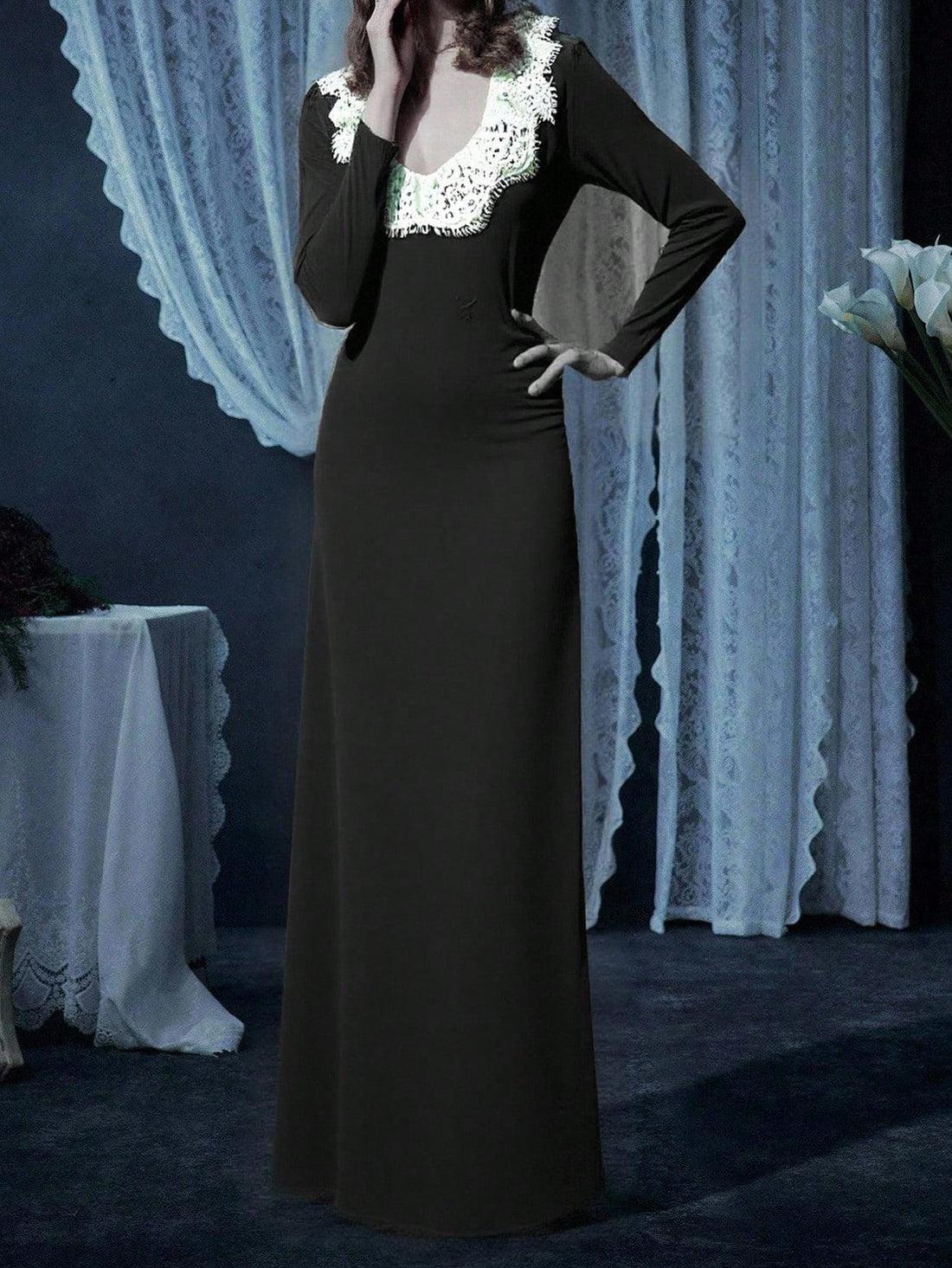 Black velvet gothic dress for women featuring contrast lace trim, sweetheart neckline, long sleeves, and a flared high waist silhouette.