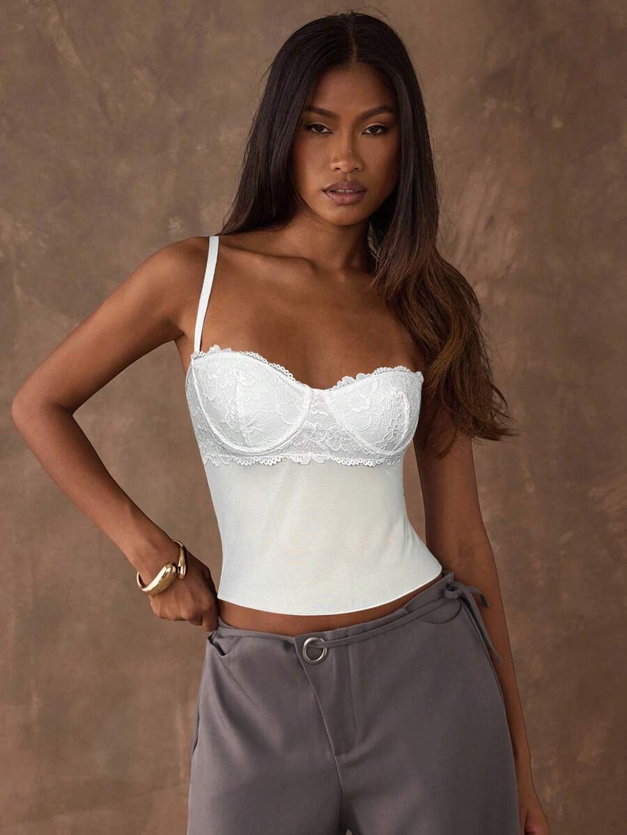 Women's black contrast lace camisole with spaghetti straps, cup detail, semi-sheer finish, and slim fit for going out or date night.