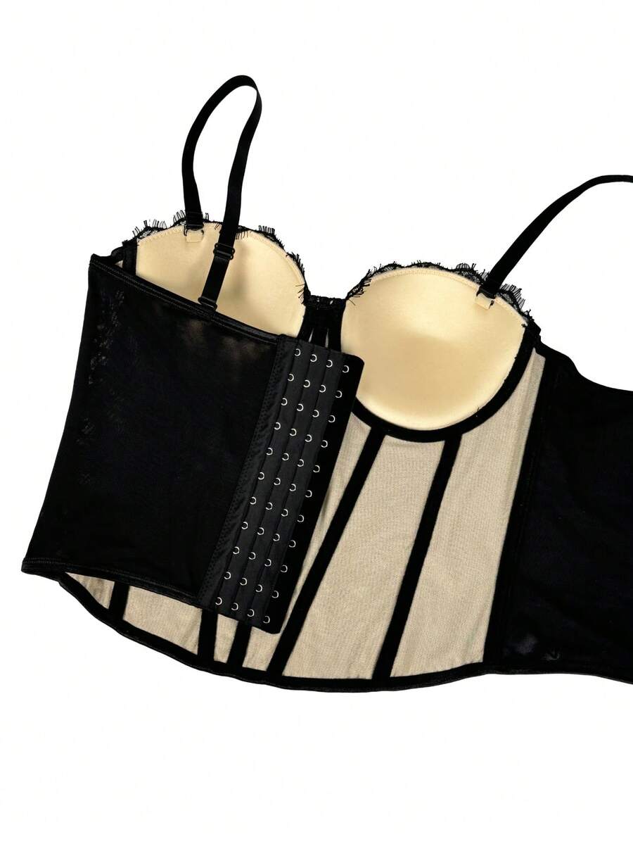 Black women's shaping cami with contrast lace, spaghetti straps, asymmetrical hem, lined body, and slim fit for casual and night-out styling.