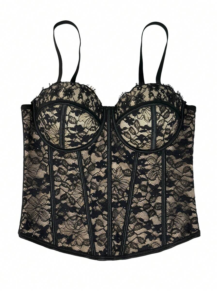 Black women's shaping cami with contrast lace, spaghetti straps, asymmetrical hem, lined body, and slim fit for casual and night-out styling.