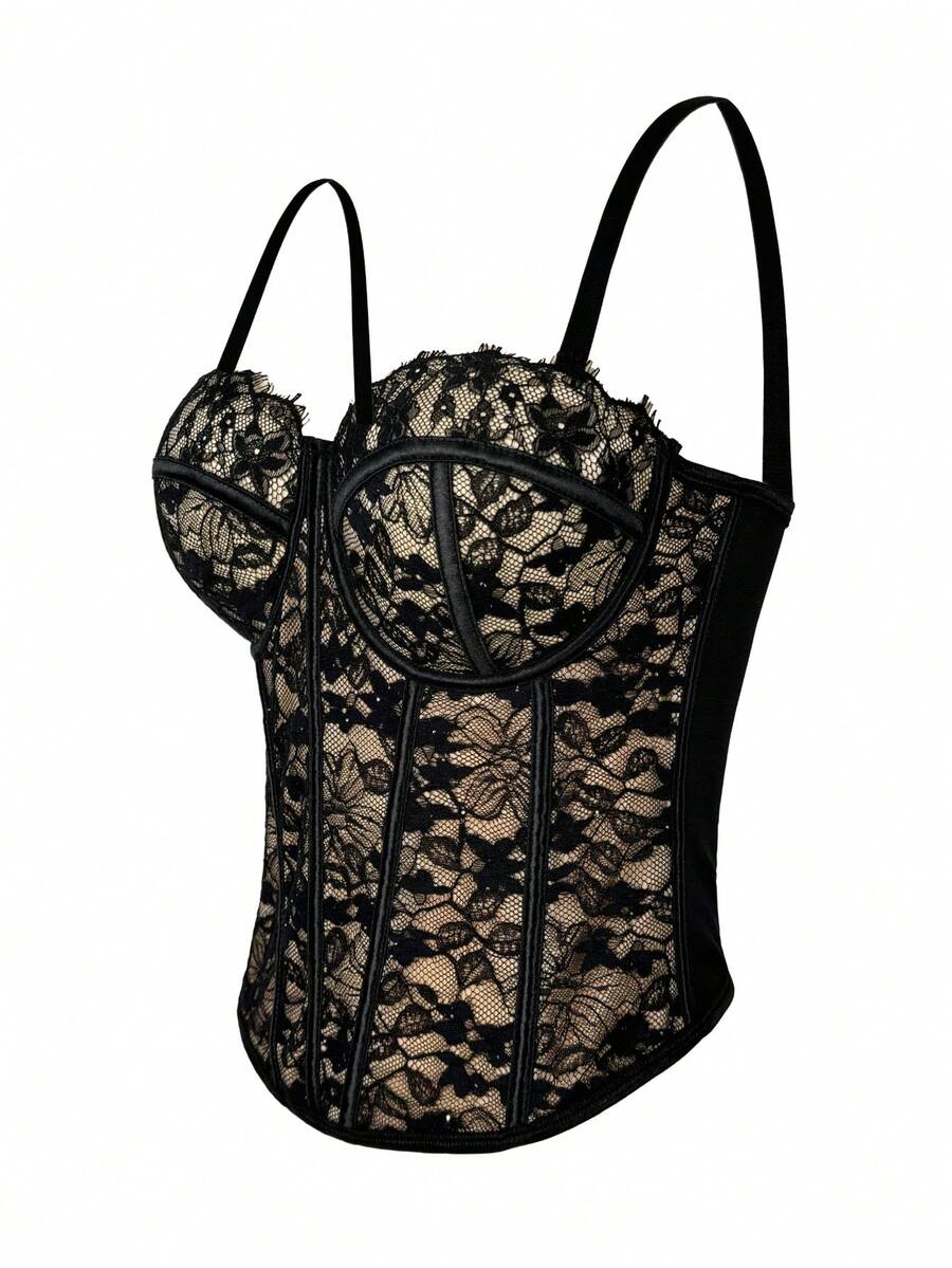 Black women's shaping cami with contrast lace, spaghetti straps, asymmetrical hem, lined body, and slim fit for casual and night-out styling.