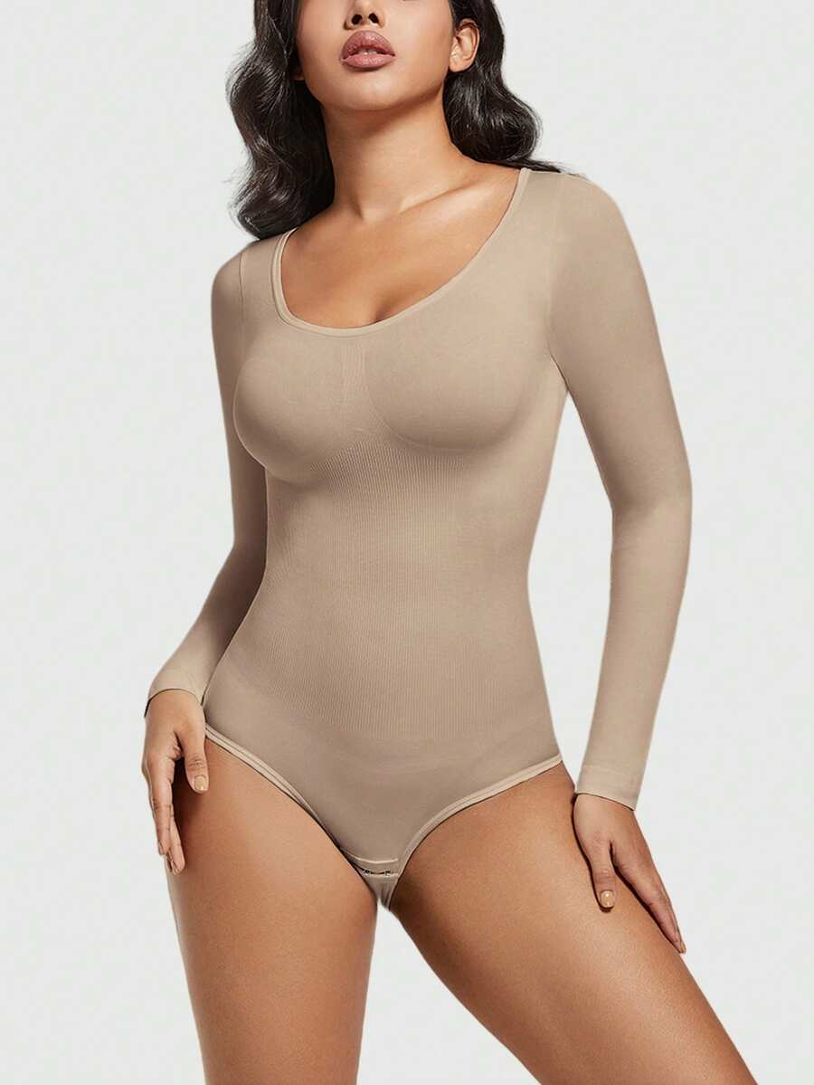 Women's black seamless bodysuit shapewear with tummy control and butt lift design.