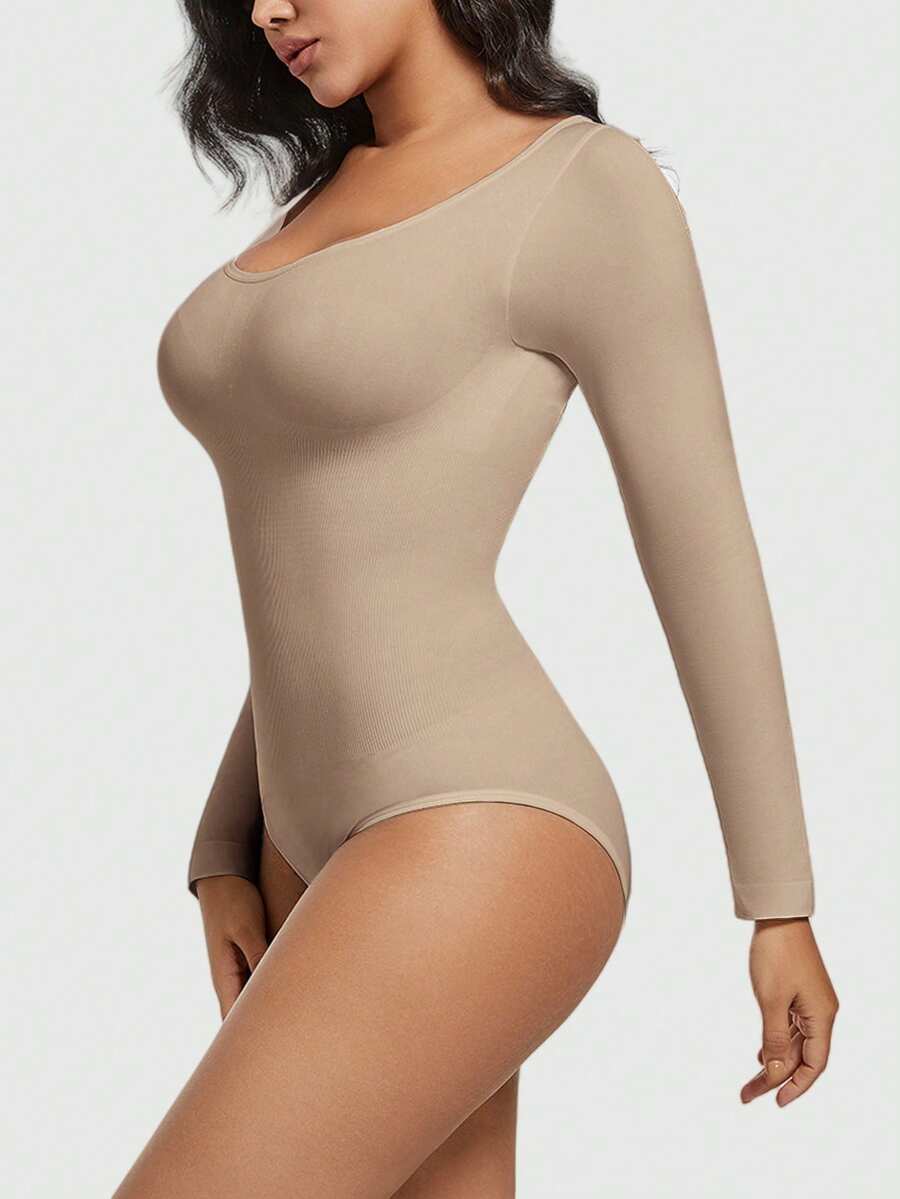 Women's black seamless bodysuit shapewear with tummy control and butt lift design.