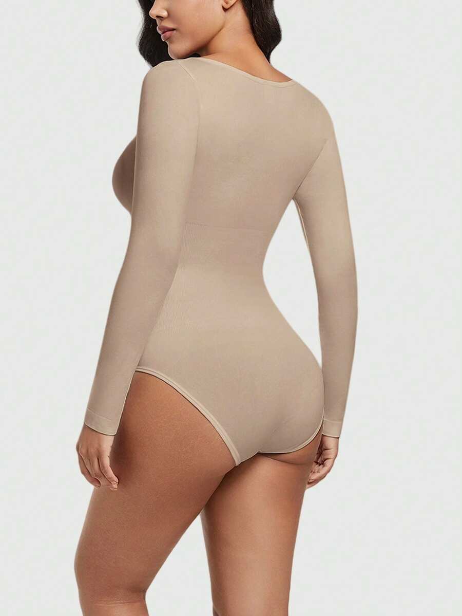 Women's black seamless bodysuit shapewear with tummy control and butt lift design.