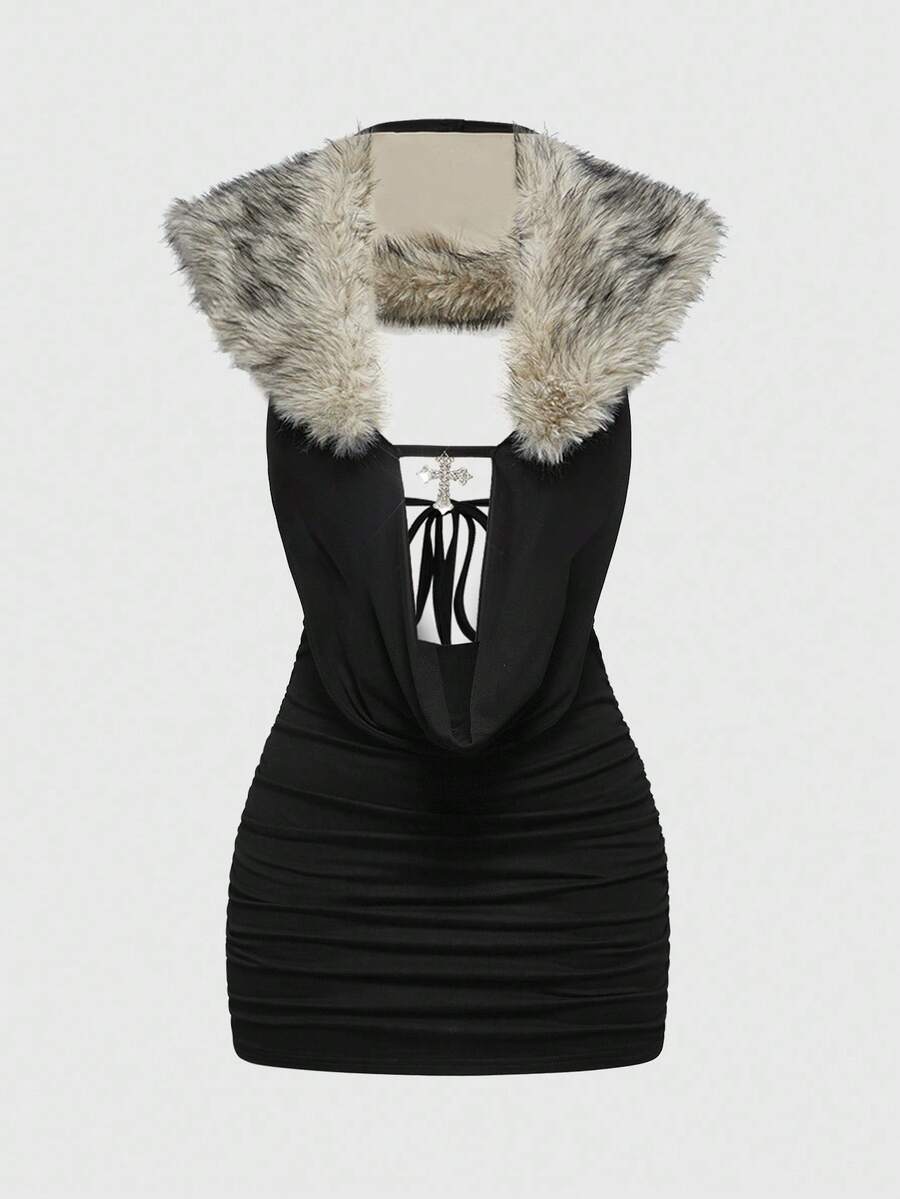 Women's black halter bodycon mini dress with deep V neckline, chain detail, backless design, and contrast faux fur accent.