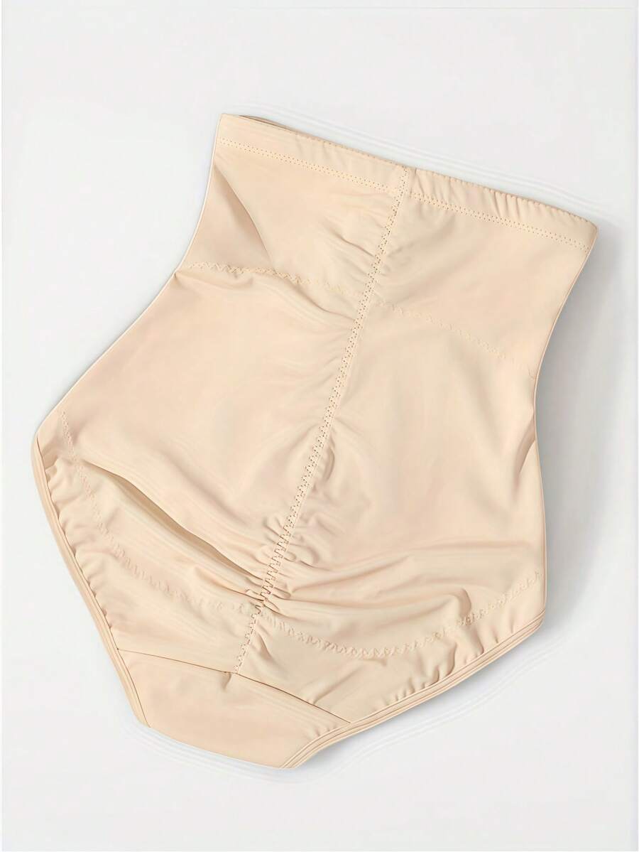 Women's black super high waist shaping pants with zipper closure, strong tummy control, and butt lifting feature.