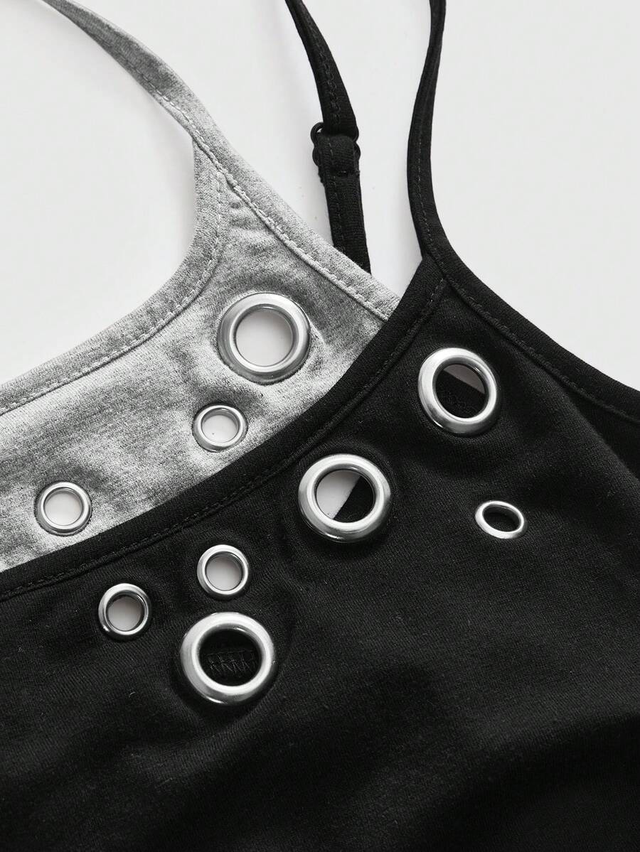 Black halter crop tank top for women featuring lace up front details, ruched accents, and appliques in a slim fit knitted fabric.