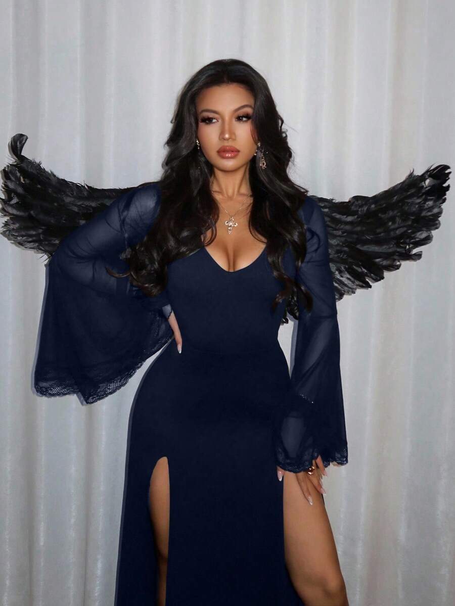 Women's slim-fit long goth dress in black featuring a deep V-neckline, extra-long flared sleeves, and a split thigh detail.