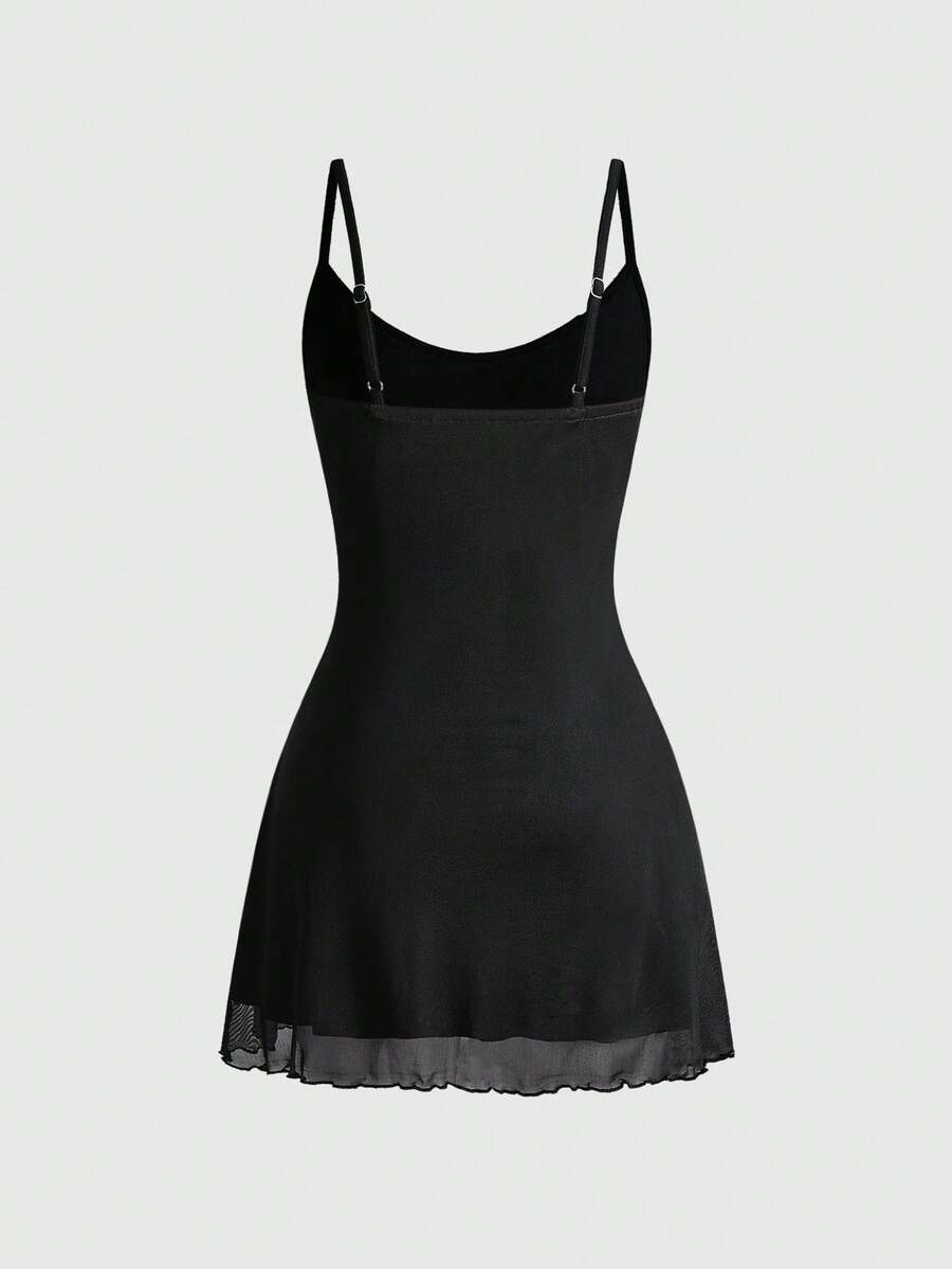 Women's black Gothic skeleton print mesh cami mini dress featuring ruched details, lettuce trim, and thin spaghetti straps.