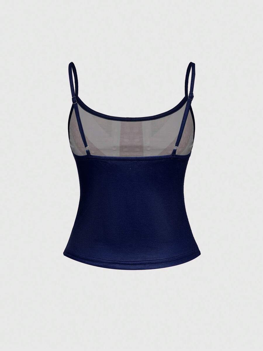 Black spaghetti strap crop camisole top for women featuring a vintage UK flag print with rhinestone and rivet details.