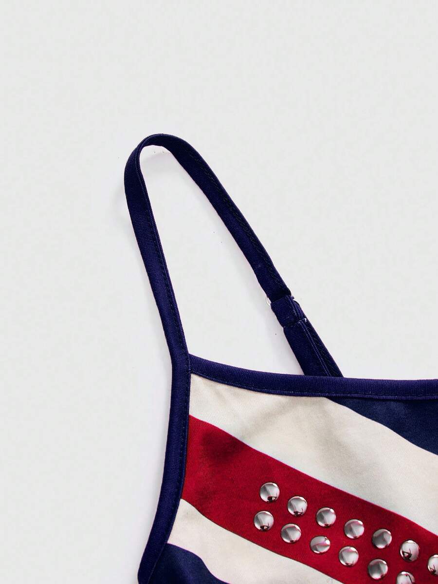 Black spaghetti strap crop camisole top for women featuring a vintage UK flag print with rhinestone and rivet details.