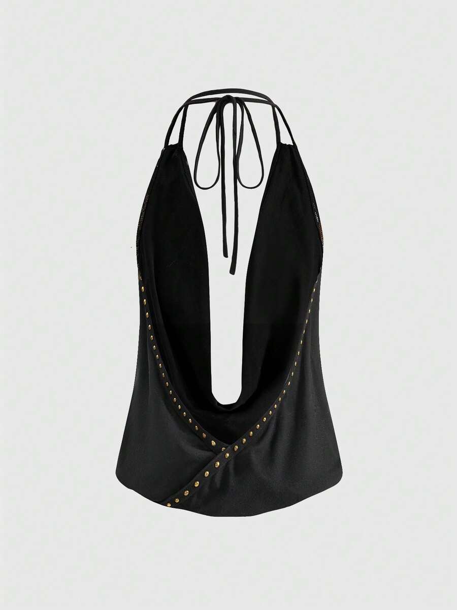 Front view of women's black halter tank top featuring graphic print, rhinestone embellishments, and a backless tie-back design.