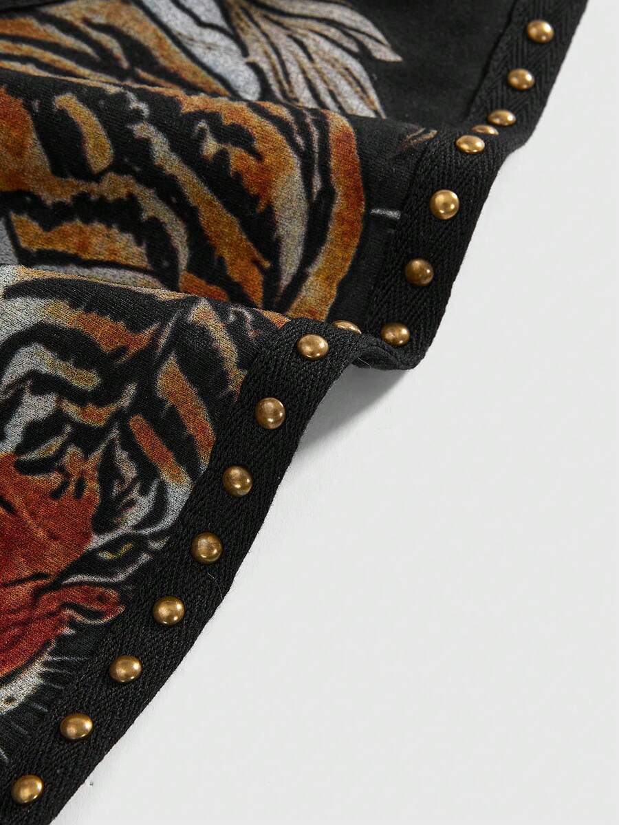 Front view of women's black halter tank top featuring graphic print, rhinestone embellishments, and a backless tie-back design.