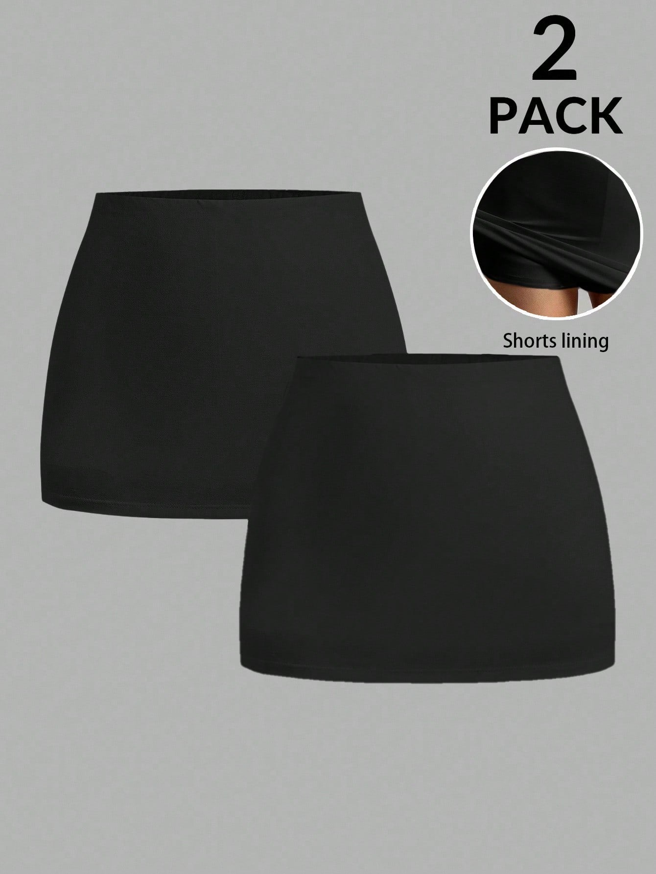 Women's black casual low rise bodycon mini skort with built-in shorts in knitted plain stretch fabric.