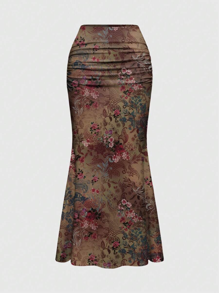 Black low waist ruched bodycon maxi skirt with sun and moon full print pattern on high stretch knitted fabric.