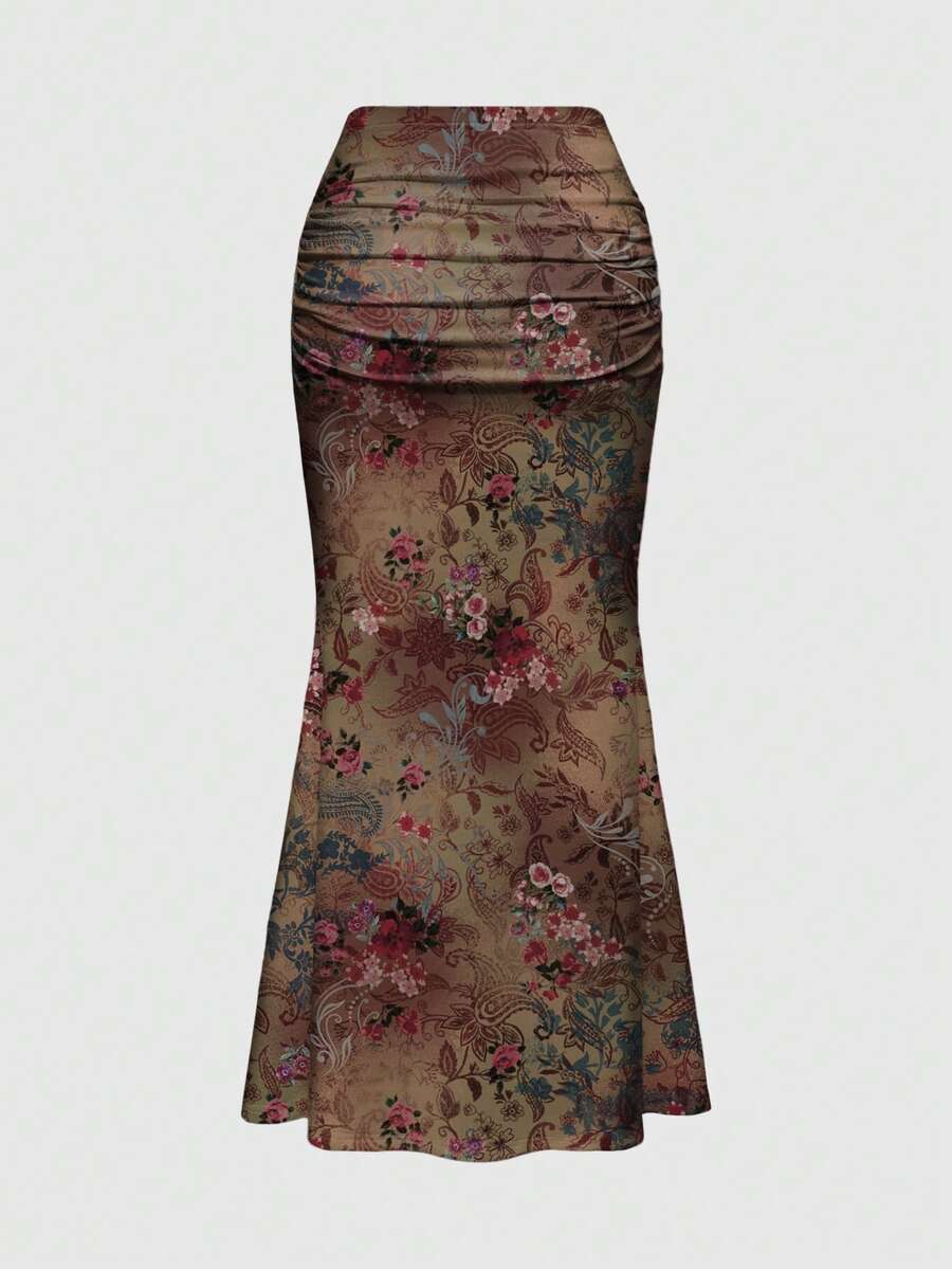Black low waist ruched bodycon maxi skirt with sun and moon full print pattern on high stretch knitted fabric.
