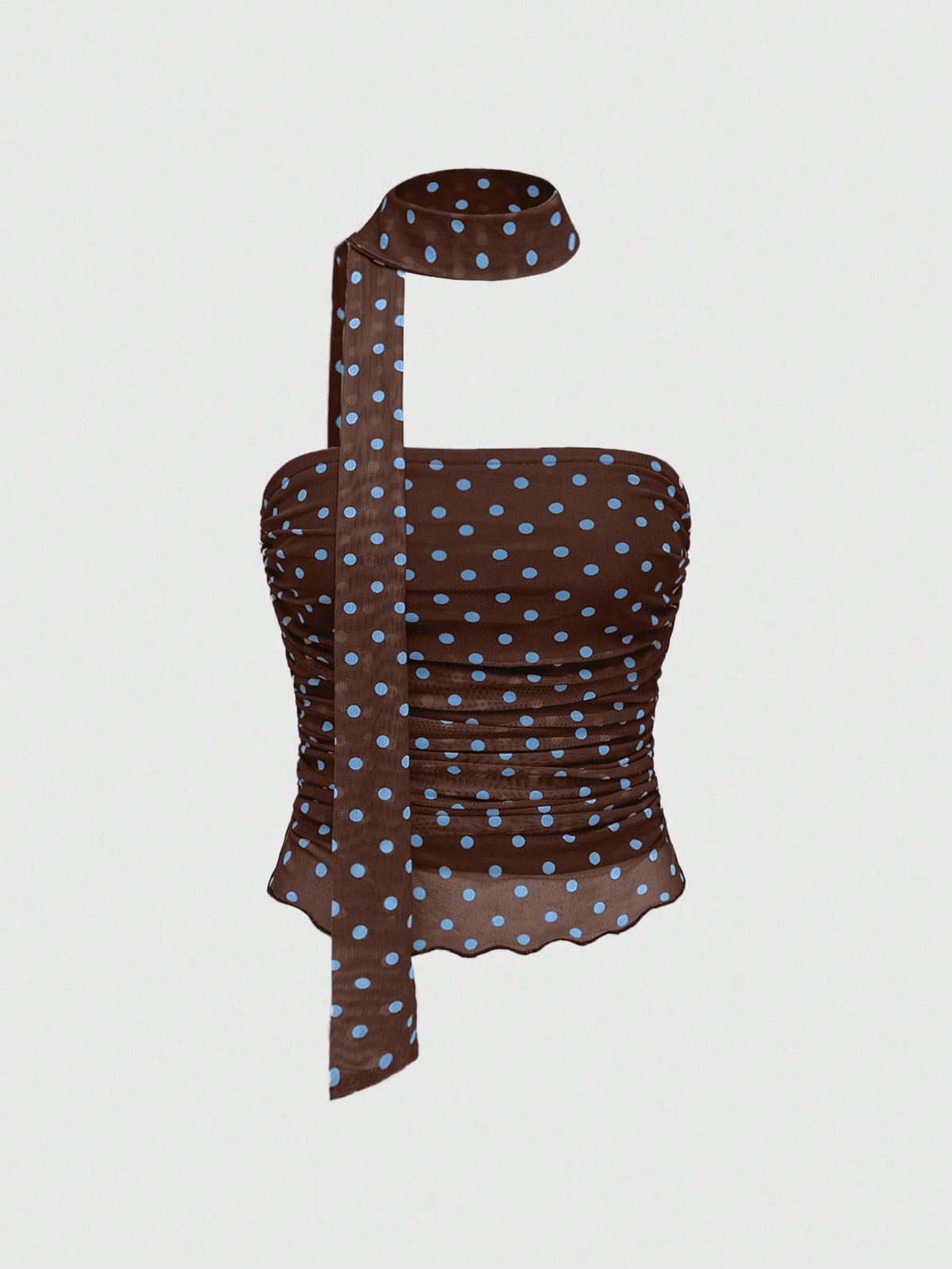 Women's black polka dot strapless tube top made of ruched mesh fabric featuring an asymmetrical hem and matching scarf.