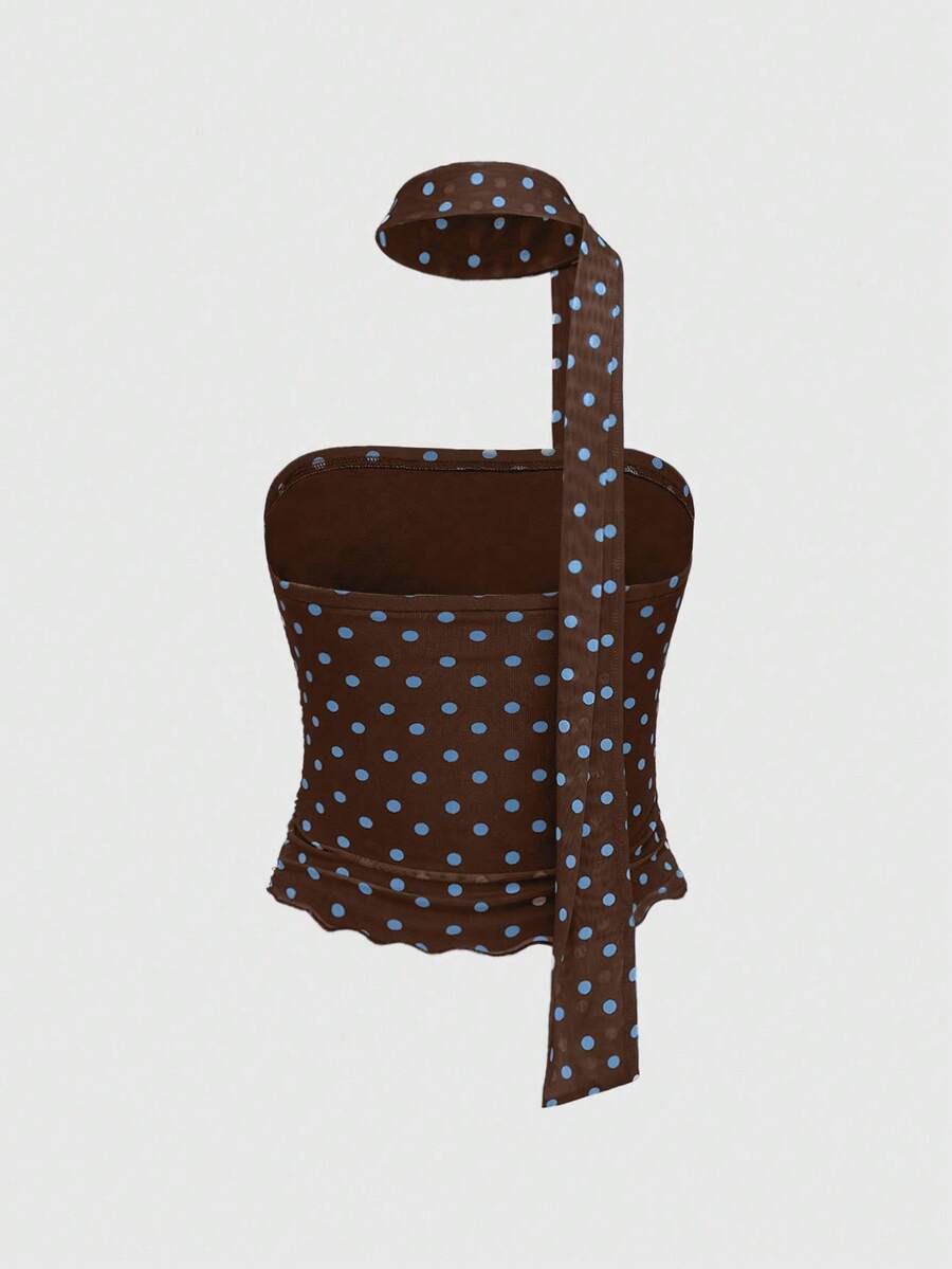 Women's black polka dot strapless tube top made of ruched mesh fabric featuring an asymmetrical hem and matching scarf.