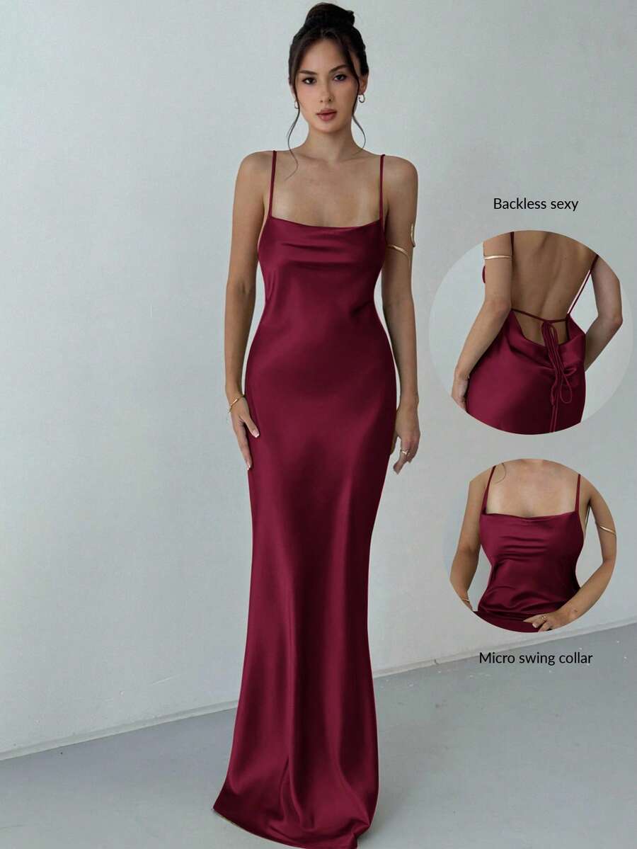 Beige satin backless maxi dress featuring criss-cross spaghetti straps and a mermaid hemline.