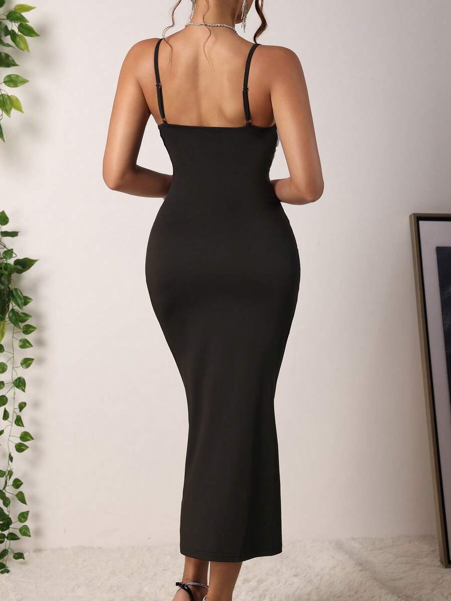 Women's black lace patchwork bodycon midi dress with sleeveless slim fit cut.