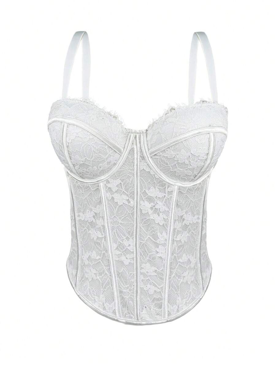 Black women's shaping cami with contrast lace, spaghetti straps, asymmetrical hem, lined body, and slim fit for casual and night-out styling.