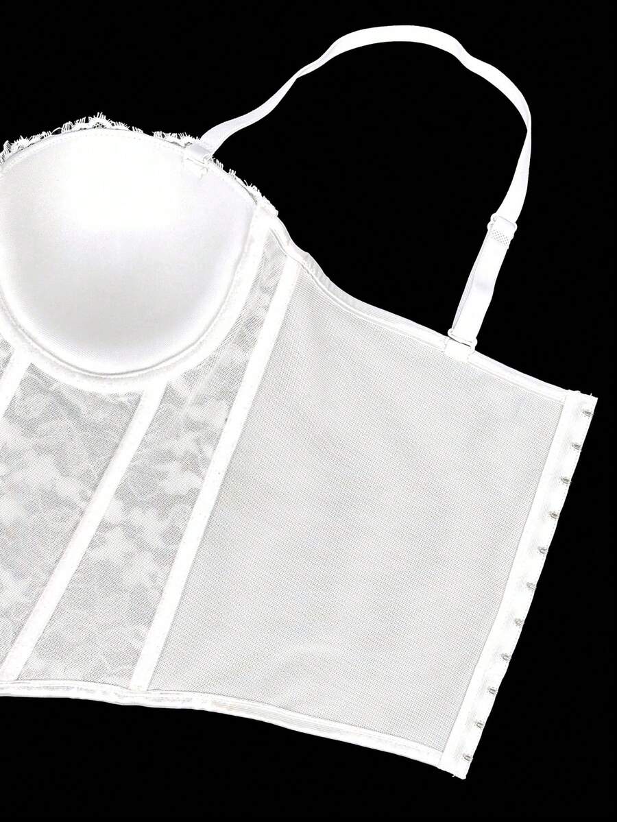 Black women's shaping cami with contrast lace, spaghetti straps, asymmetrical hem, lined body, and slim fit for casual and night-out styling.