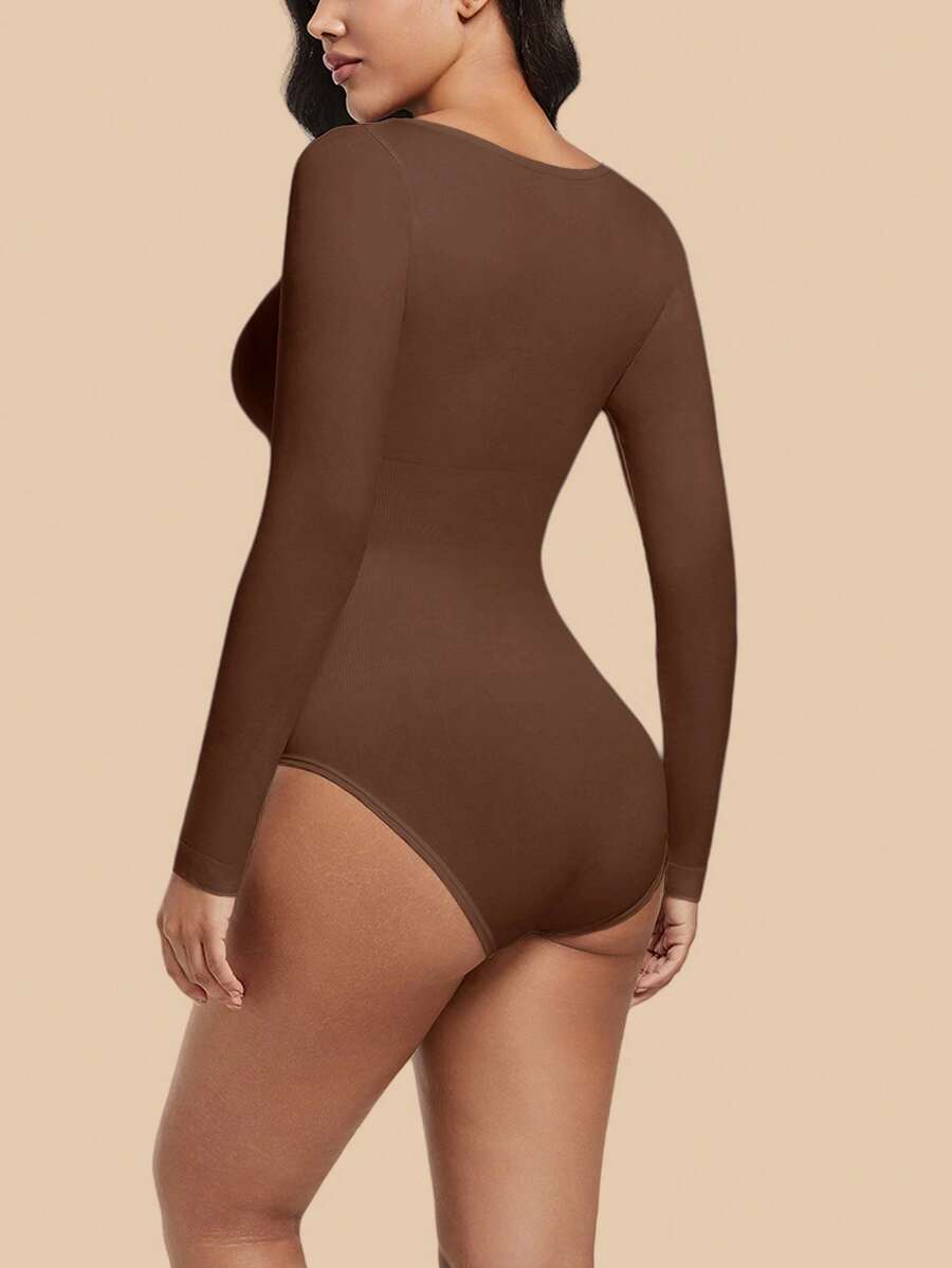 Women's black seamless bodysuit shapewear with tummy control and butt lift design.