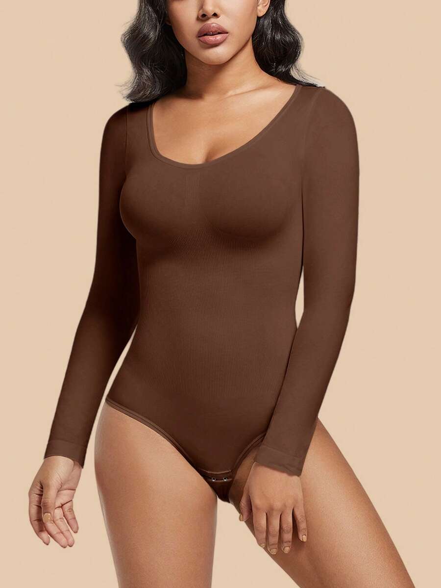 Women's black seamless bodysuit shapewear with tummy control and butt lift design.