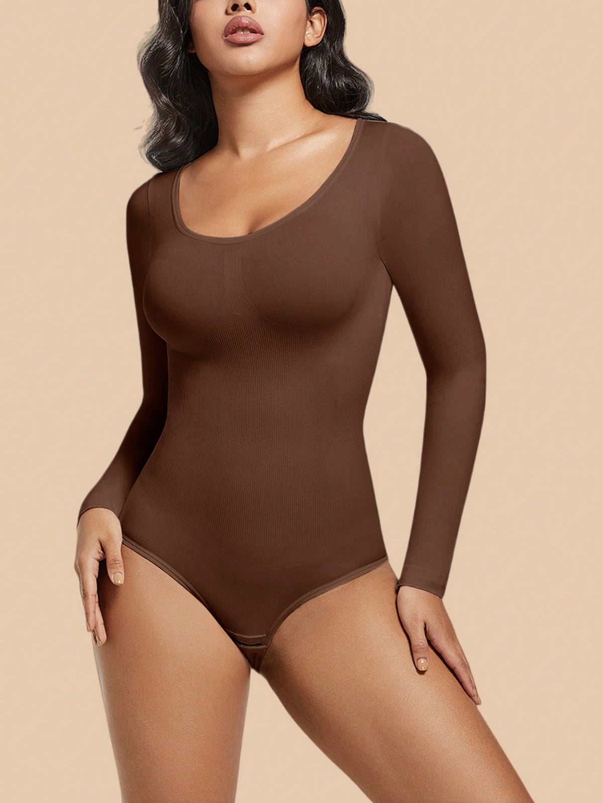 Women's black seamless bodysuit shapewear with tummy control and butt lift design.
