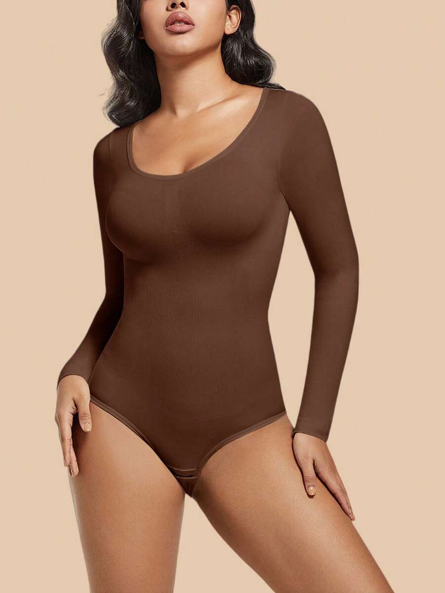 Women's black seamless bodysuit shapewear with tummy control and butt lift design.