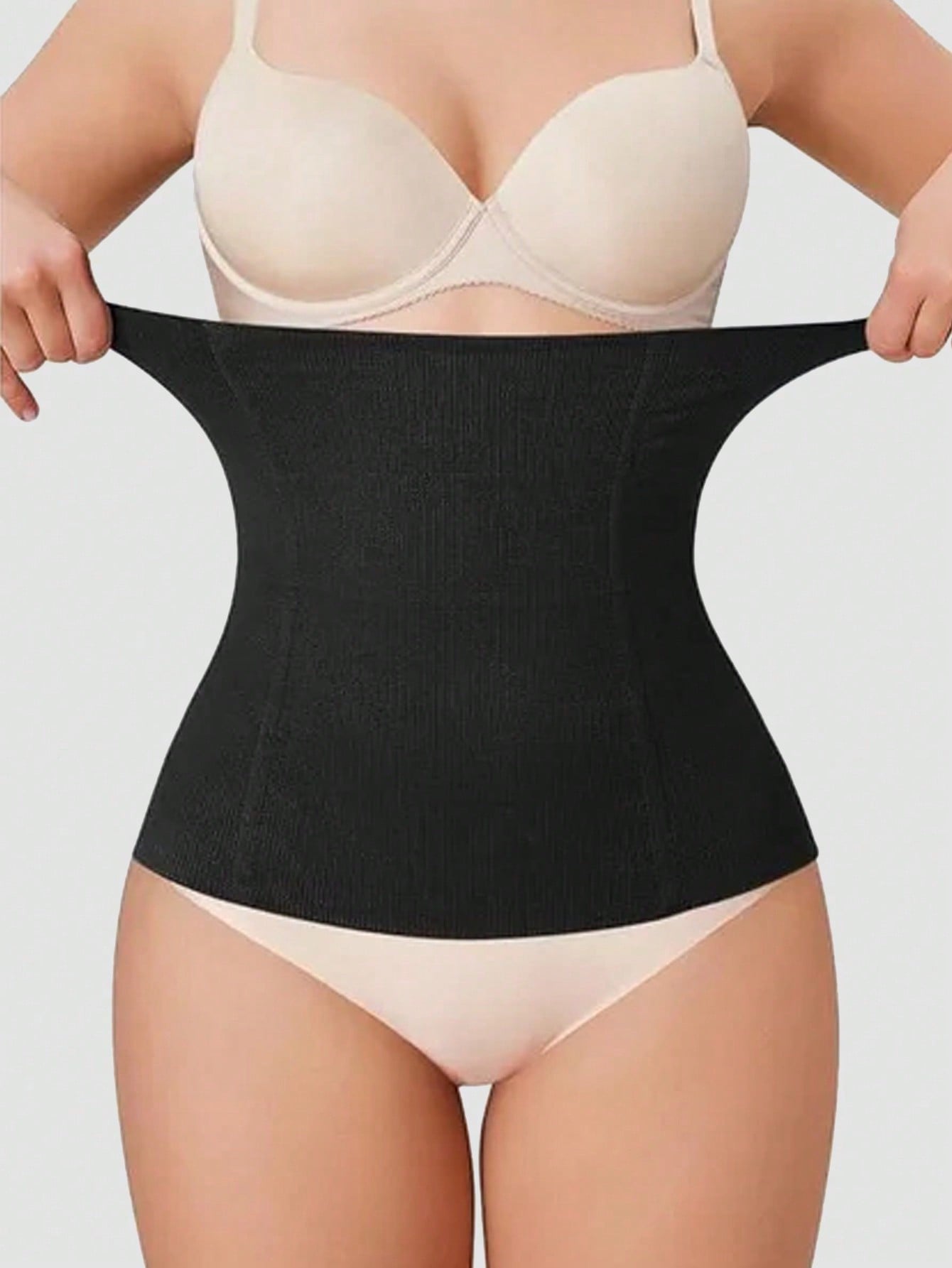 Black women's seamless waist cincher belt for waist support and daily wear.