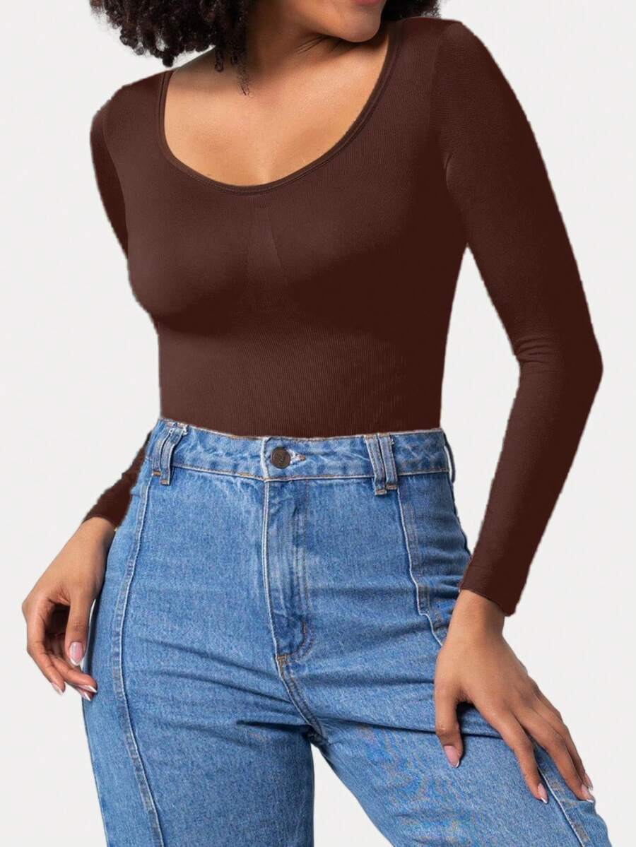 Black seamless long sleeve crew neck shapewear bodysuit for women featuring full coverage tummy control.