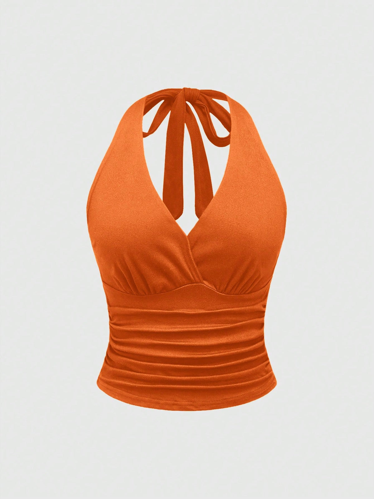 Women's halter crop tank top featuring a backless silhouette and ruched detailing in a slim fit design.