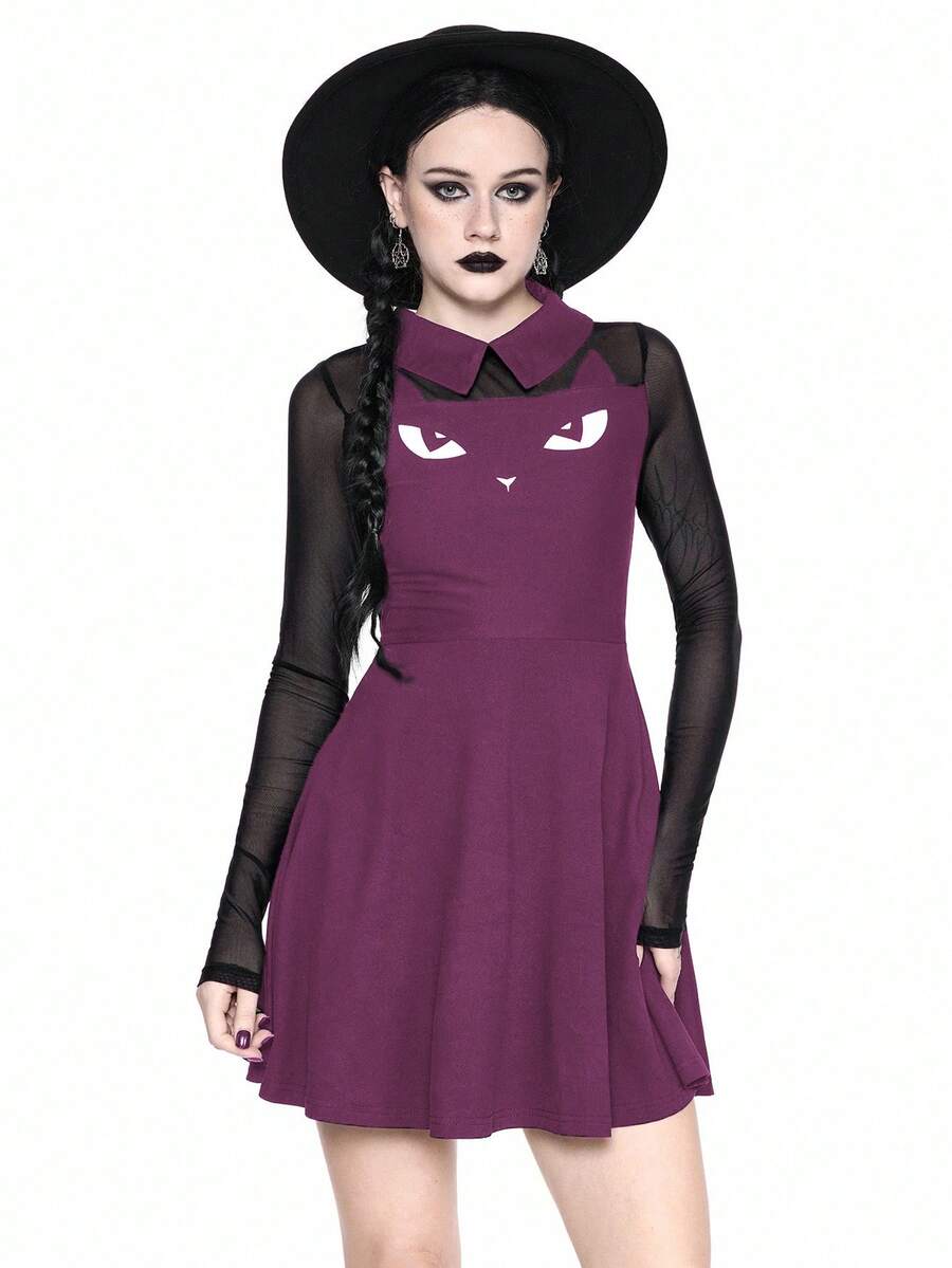 Women wearing a black gothic Halloween cat graphic print mini dress with a collar, extra-long sleeves, and a high waist fit and flare silhouette.