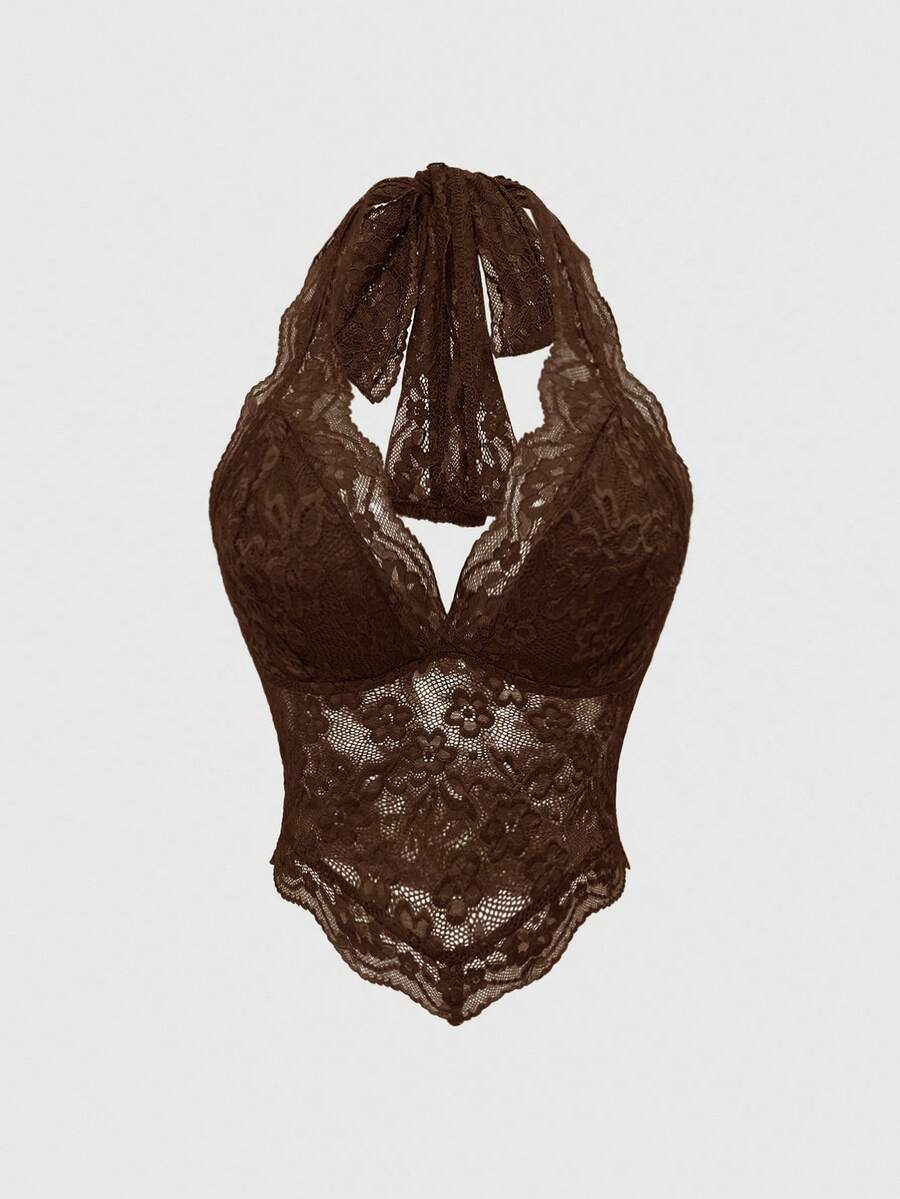 Women's black lace halter neck camisole featuring a backless crop silhouette, contrast lace trim, and scallop hem.